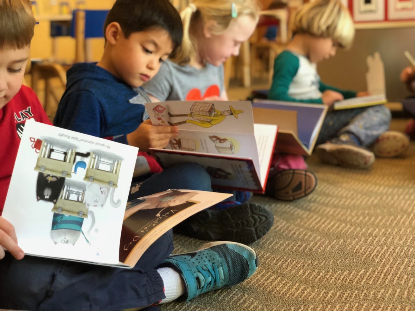 Children reading at The Ross Preschool